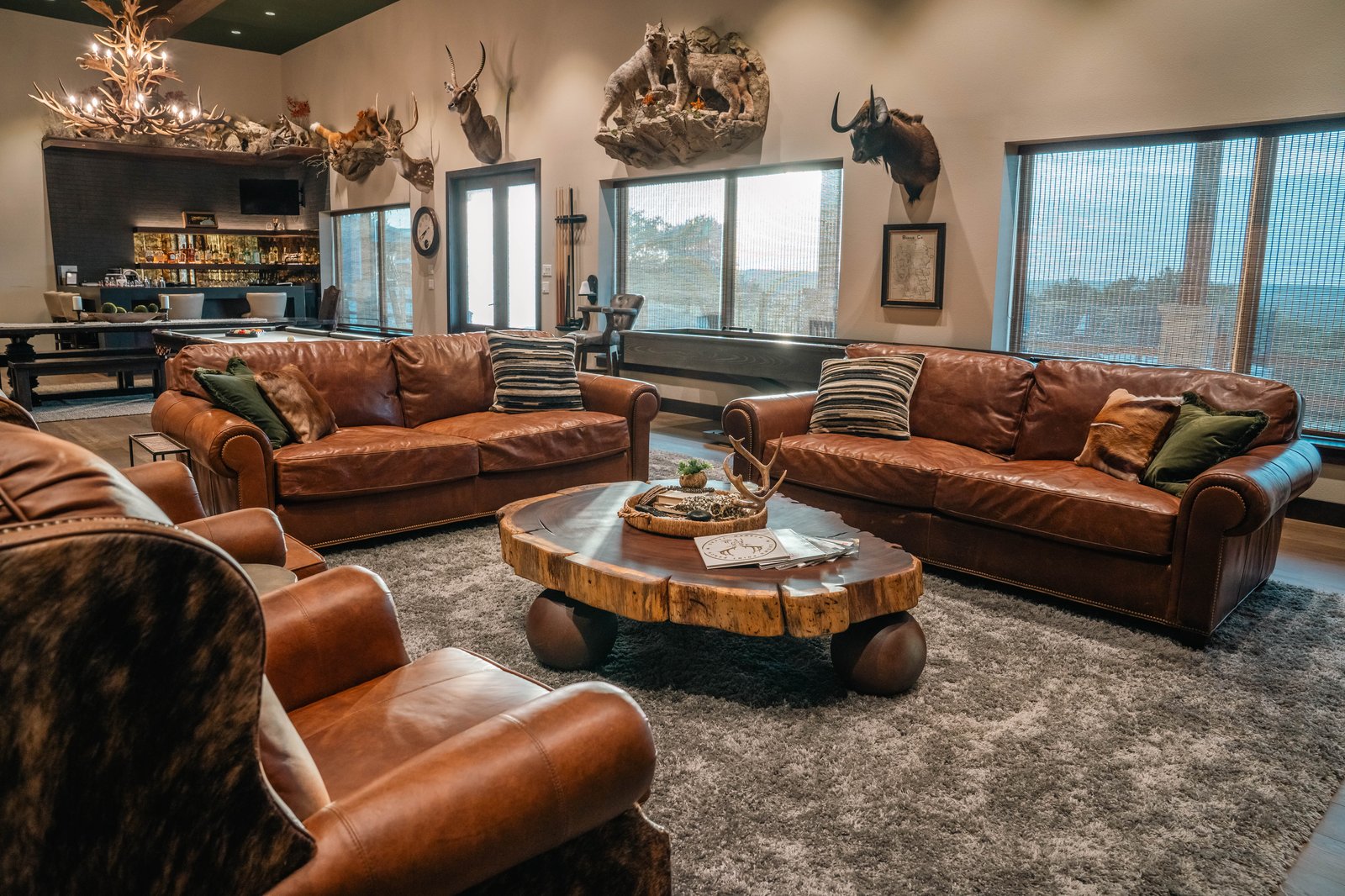 Custom leather furniture and burl coffee table in the great room